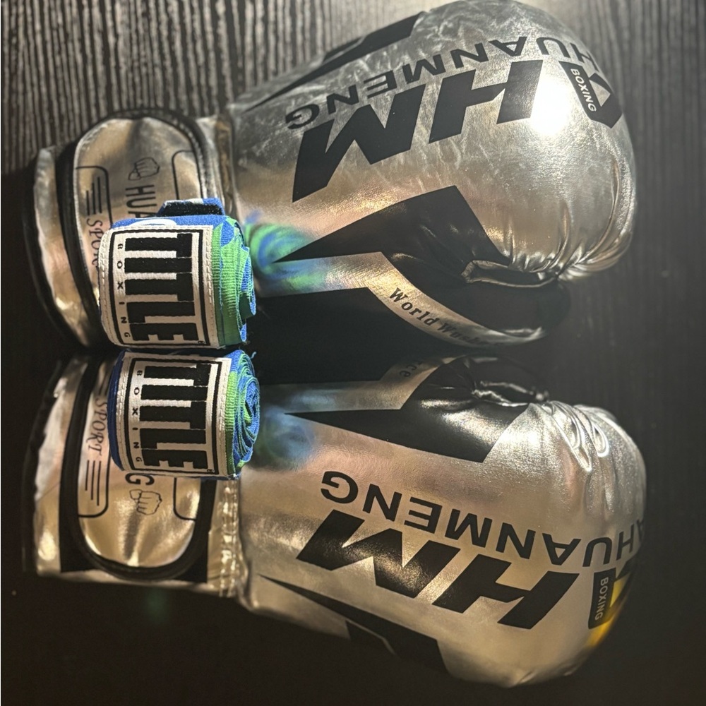 Boxing Gloves 10oz Never Used, and TITLE Boxing Hand Wrap Used a Couple Times.